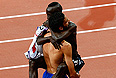 Француз Махидин Мехисси-Бенаббад, занявший второе место, и кениец Эзекиль Кембой, занявший первое место в беге на 3000 м с препятствиями в финале соревнований по легкой атлетике на ХХХ летних Олимпийских играх.