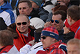 Президент России Владимир Путин и председатель правительства России Дмитрий Медведев (слева направо на втором плане) на трибуне во время эстафеты в соревнованиях по лыжным гонкам среди мужчин на XXII зимних Олимпийских играх в Сочи.