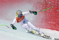 Тед Лигети (США) на трассе слалома-супергиганта на соревнованиях по горнолыжному спорту среди мужчин на XXII зимних Олимпийских играх в Сочи.