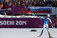 Маркус Хельнер (Швеция) на финише эстафеты в соревнованиях по лыжным гонкам среди мужчин на XXII зимних Олимпийских играх в Сочи.