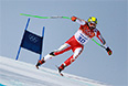 Мануэль Осборн-Паради (Канада) на трассе слалома-супергиганта на соревнованиях по горнолыжному спорту среди мужчин на XXII зимних Олимпийских играх в Сочи.