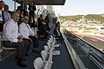 Президент России Владимир Путин смотрит Гран-при России в компании генерального промоутера "Формулы-1" Берни Экклстоуна.