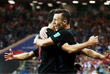 Хорватские футболисты Иван Перишич и Йосип Пиварич празднуют гол в матче чемпионата мира против Исландии