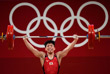 Японский спортсмен Йоичи Итоказу во время соревнований по тяжелой атлетике среди мужчин в весовой категории до 61 кг