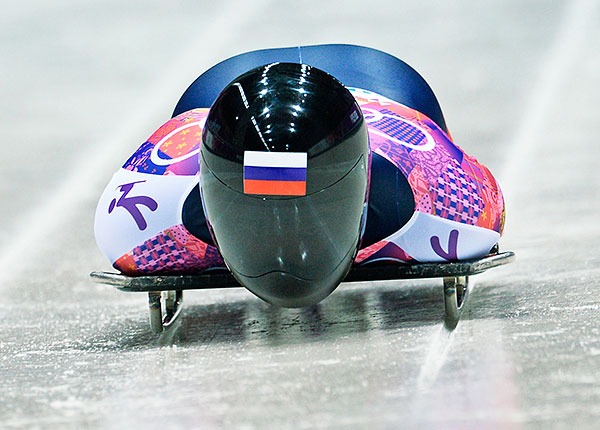 Никита Трегубов (Россия) на старте в третьем заезде на соревнованиях по скелетону среди мужчин на XXII зимних Олимпийских играх в Сочи.